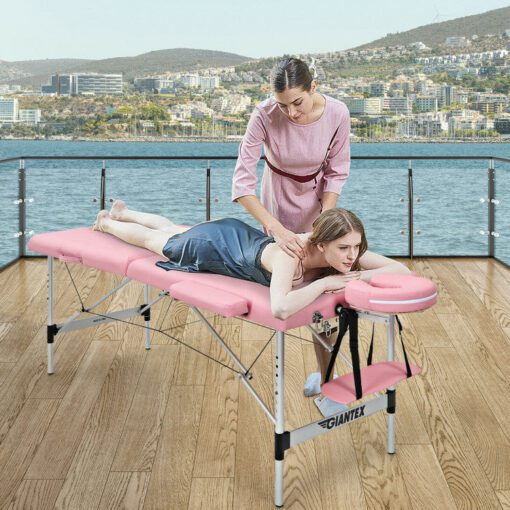 500 units of 84 Inch Portable Massage Table Lash Bed with adjustable height and carry case, in pink color, arranged for bulk wholesale.